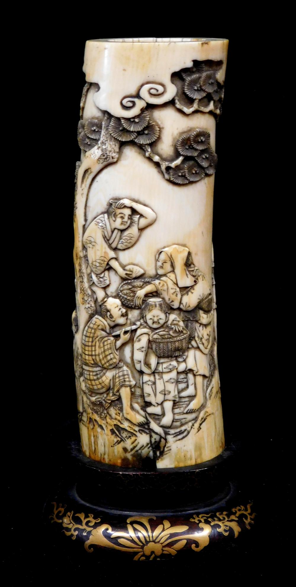 Appraisal: ASIAN Carved ivory tusk on stand Japanese th C depicts