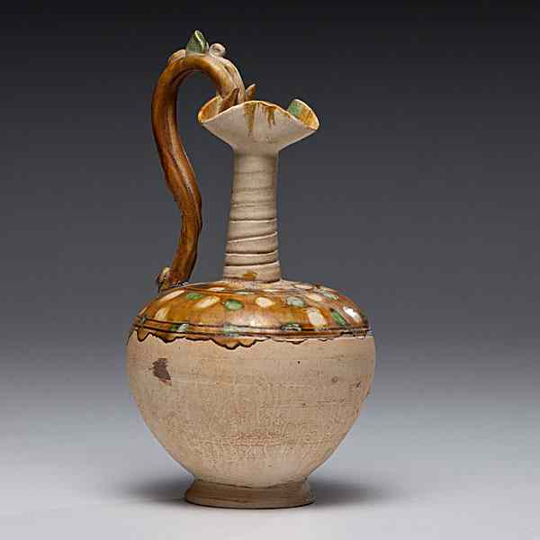 Appraisal: Sancai-Glazed Ewer Chinese a sancai-glazed stoneware ewer having a globular