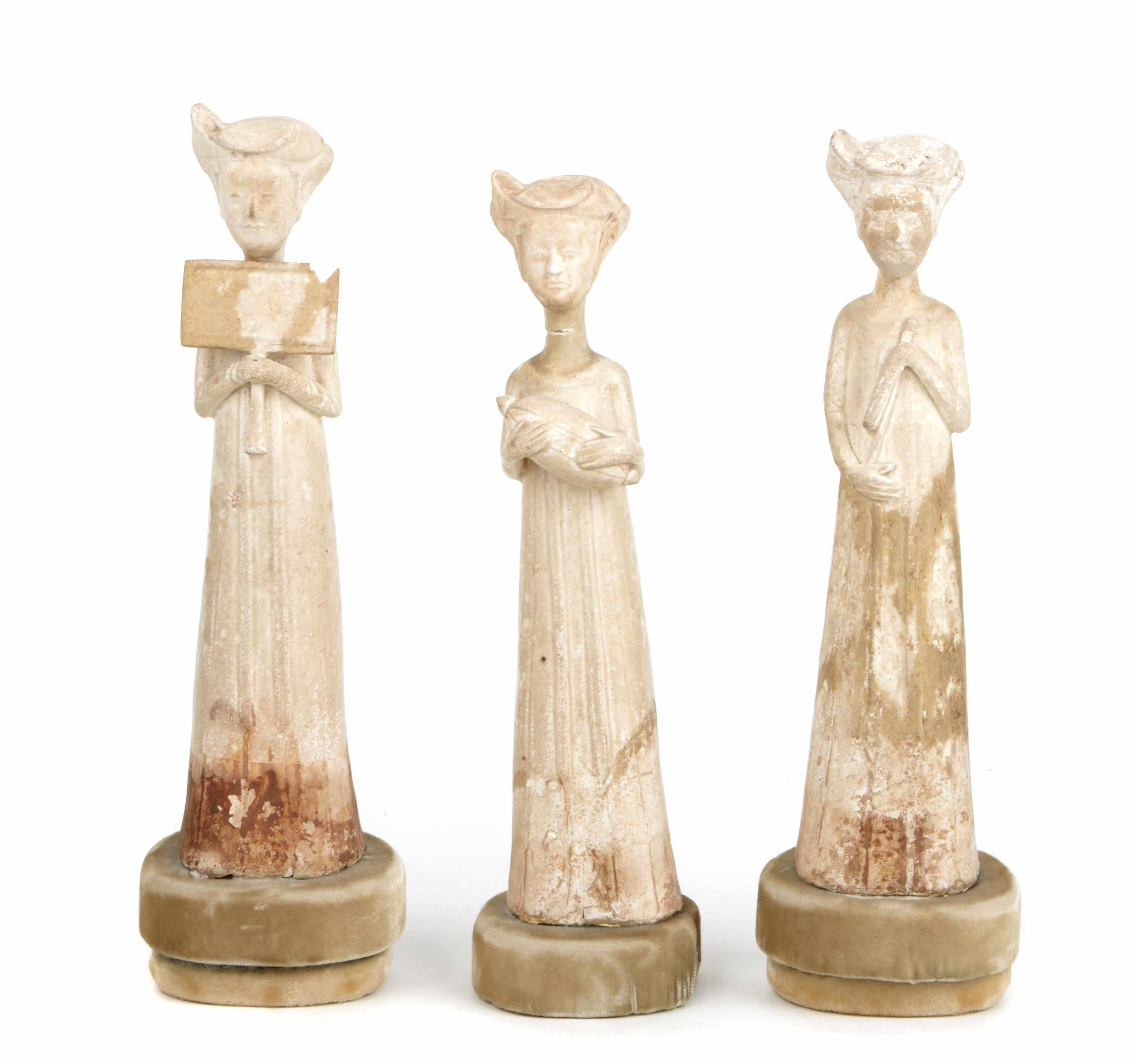 Appraisal: A group of three Chinese Tang style pottery figures of