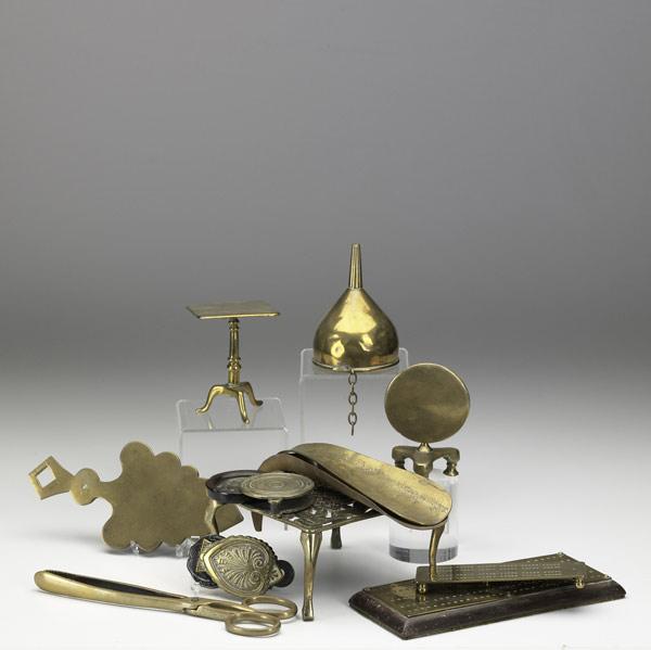 Appraisal: DECORATIVE BRASS ITEMS Twelve pieces include two miniature tilt tables