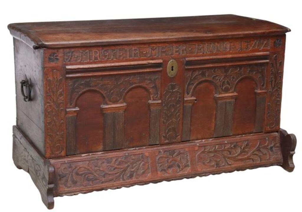 Appraisal: German oak dowry storage chest th c front carved with