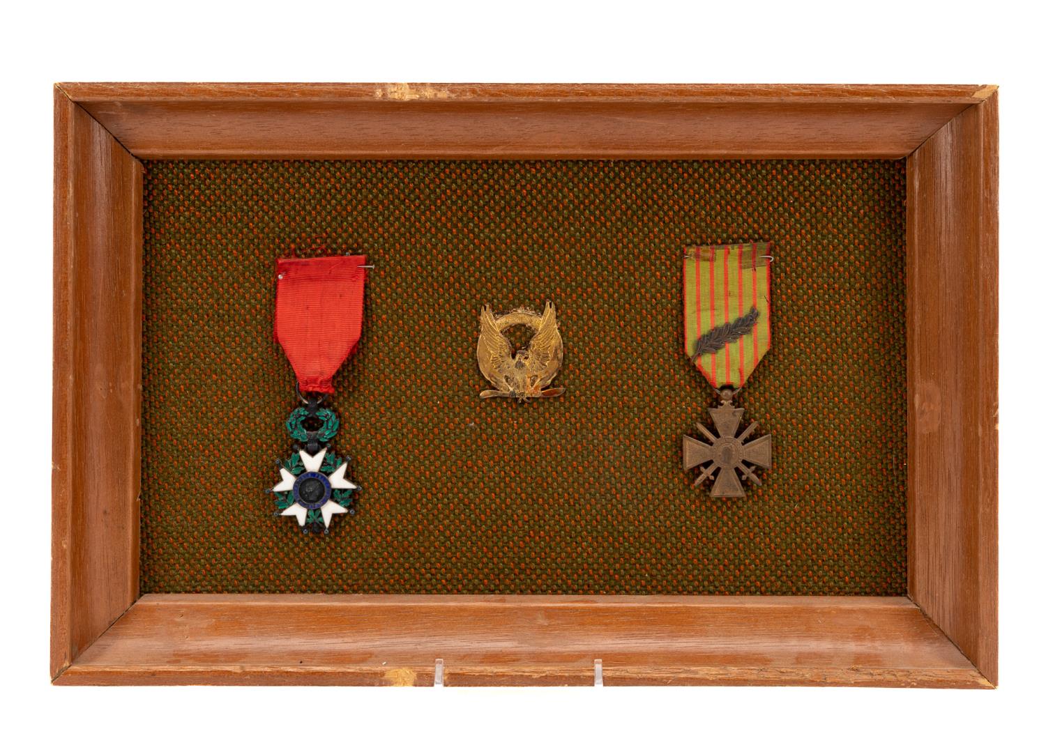 Appraisal: THREE FRAMED FRENCH WORLD WAR ONE MILITARY MEDALS Group of