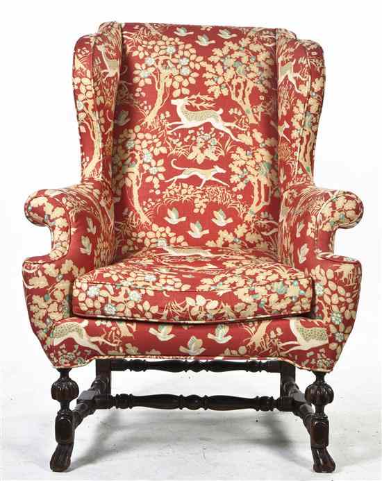 Appraisal: A William and Mary Style Wing Back Armchair having upholstered