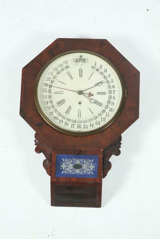 Appraisal: GILBERT OCTAGONAL CALENDAR CLOCK Walnut time only clock with patented