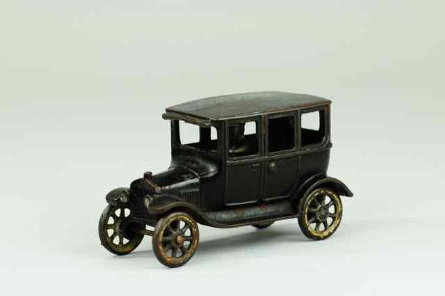 Appraisal: MODEL 'T' FOUR DOOR SEDAN Arcade cast iron painted black