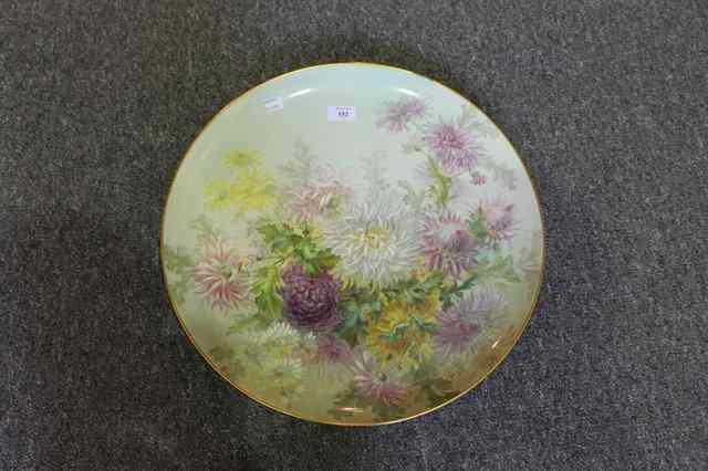 Appraisal: A CERAMIC PANEL with painted floral decoration of carnations with