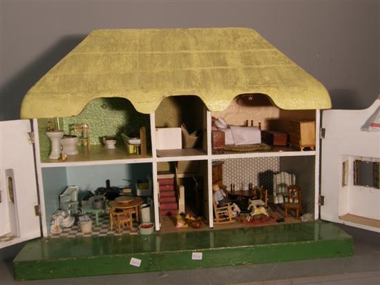 Appraisal: Twentieth century dolls house with contents modelled on Princess Elizabeth's