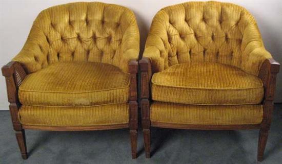 Appraisal: Pair s Gold Upholstered Arm Chairs with wicker accent on