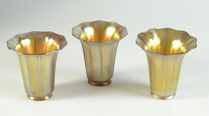 Appraisal: SET OF THREE STEUBEN AURENE ART GLASS SHADES ribbed trumpet