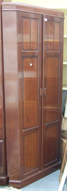 Appraisal: An early th century mahogany and boxwood strung floor standing