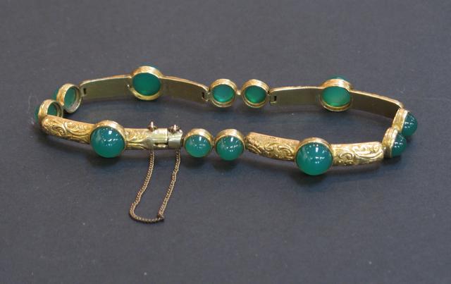 Appraisal: A VICTORIAN CT YELLOW GOLD BRACELET with chased decoration set