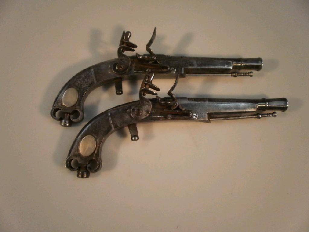 Appraisal: A pair of reproduction thC Scottish all steel ramshorn flintlock