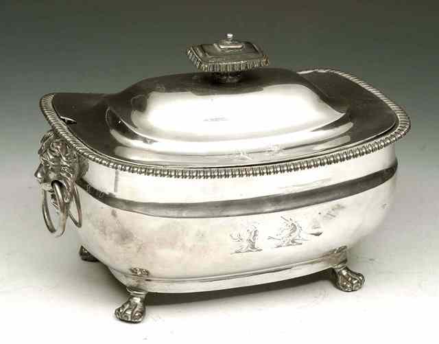 Appraisal: A GEORGE III SILVER TUREEN AND COVER oval shaped with