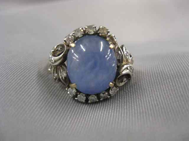 Appraisal: Diamond Blue Star Sapphire Ring cabachon gem weighing approx carats