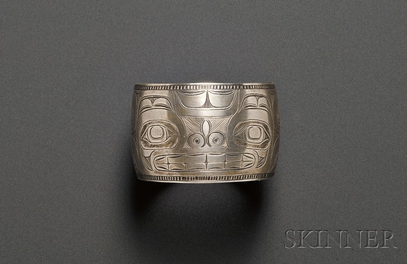 Appraisal: Northwest Coast Engraved Silver Bracelet Haida depicting a stylized bear