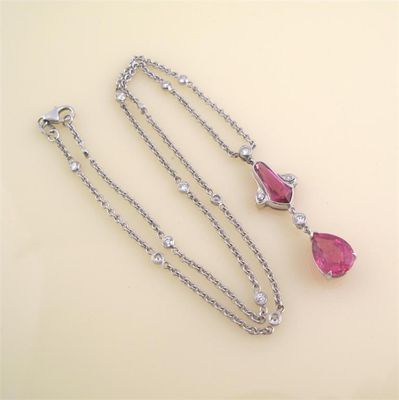 Appraisal: A pink tourmaline diamond pendant The two tourmaline's are set