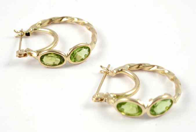 Appraisal: PAIR OF PERIDOT AND YELLOW GOLD EARRINGS each k gold