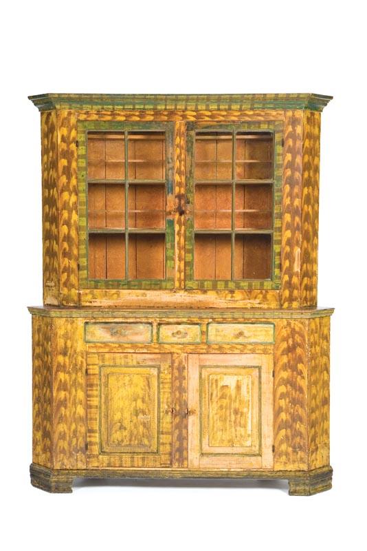 Appraisal: DECORATED CORNER CUPBOARD Pennsylvania mid th century mixed woods including