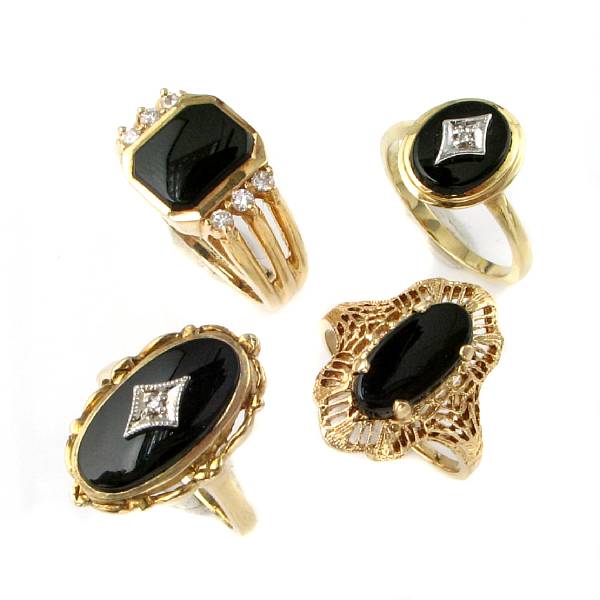 Appraisal: A collection of onyx stone and gold rings twenty-six rings