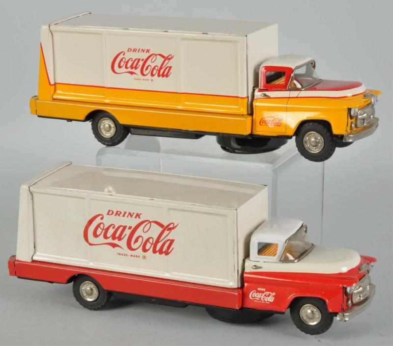 Appraisal: Lot of Coca-Cola Battery-Op Truck Toys Description s Both the