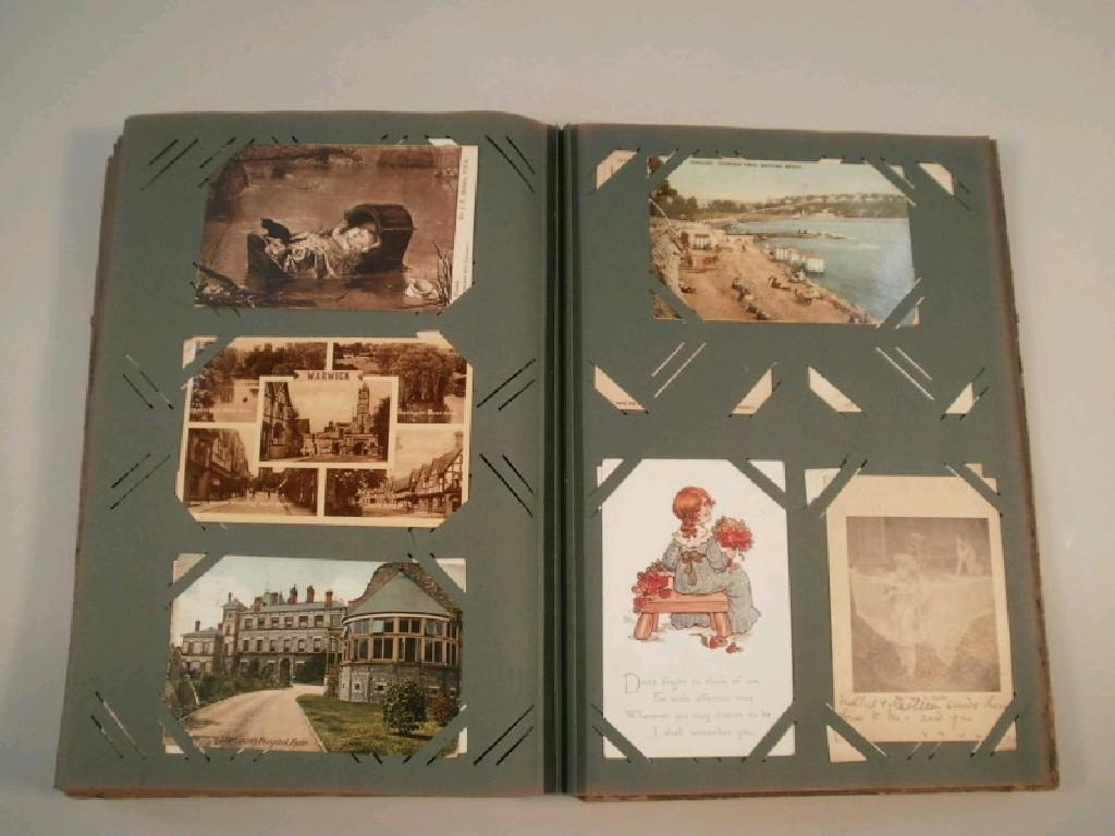 Appraisal: A postcard album containing vintage postcards of topographical scenes including