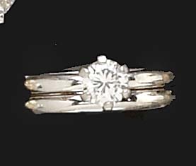 Appraisal: DIAMOND BRIDAL SET Platinum solitaire engagement ring set with one