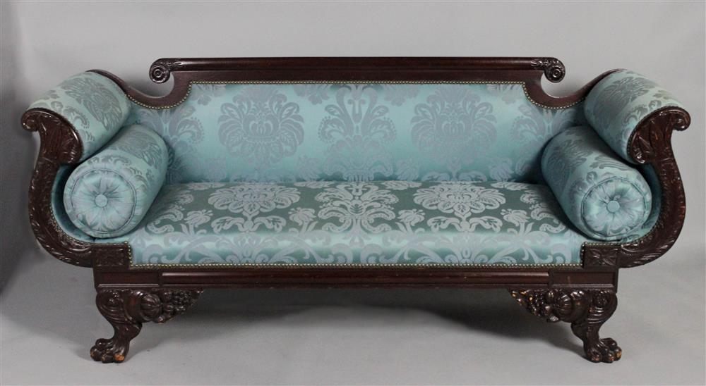 Appraisal: AMERICAN CLASSICAL STYLE CARVED MAHOGANY SOFA having a straight crest