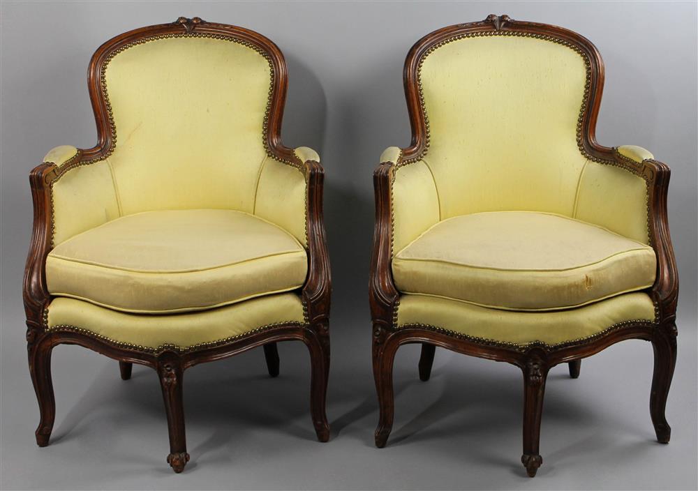 Appraisal: PAIR OF LOUIS XV WALNUT BERGERES each with shaped cushioned