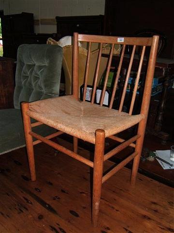 Appraisal: A set of four Hans Wegner spindle back chairs