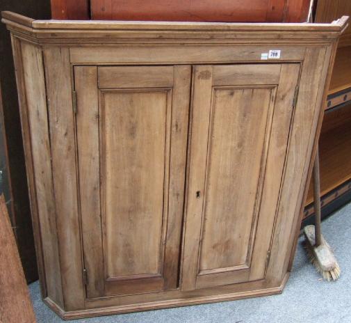 Appraisal: A th century pine hanging corner cupboards the pair of