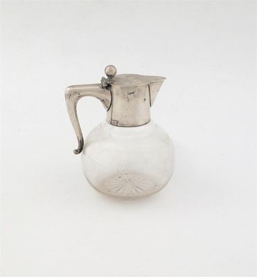 Appraisal: An early th century German liquer jug with a plain