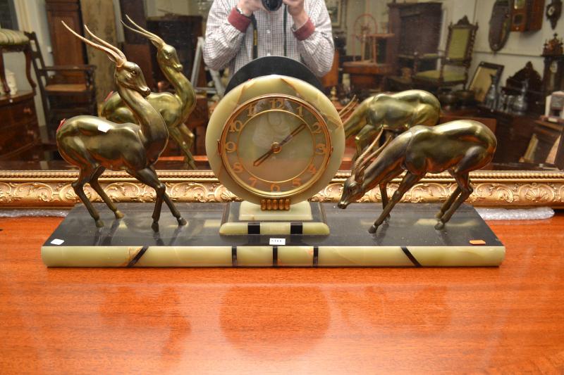 Appraisal: A FRENCH DECO MARBLE MANTEL CLOCK WITH DEER FEATURES A