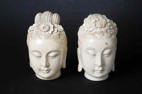 Appraisal: TWO CHINESE IVORY HEADS OF GUANYAN Early th century Carved