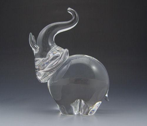 Appraisal: STEUBEN CRYSTAL TRUMPETING ELEPHANT Designed by James Houston in Available