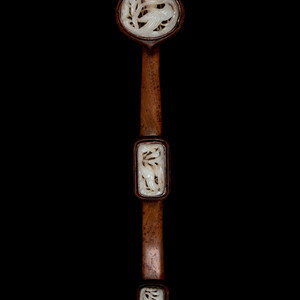 Appraisal: A Chinese White Jade Inset Hardwood Ruyi Scepter each jade