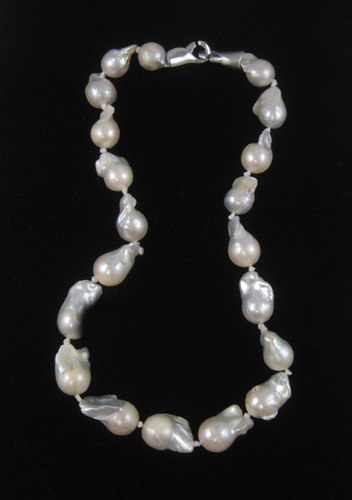 Appraisal: PRINCESS LENGTH WHITE PEARL NECKLACE strung with baroque grey pearls