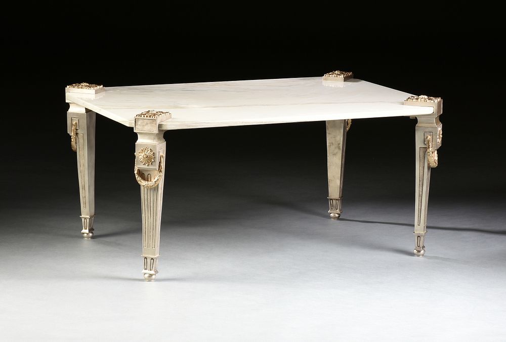 Appraisal: A HOLLYWOOD REGENCY STYLE SILVERED AND GILT BRONZE MARBLE TOP