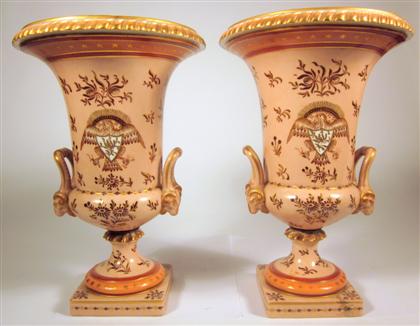 Appraisal: Pair of Empire style painted porcelain urnsCampana form the gadrooned