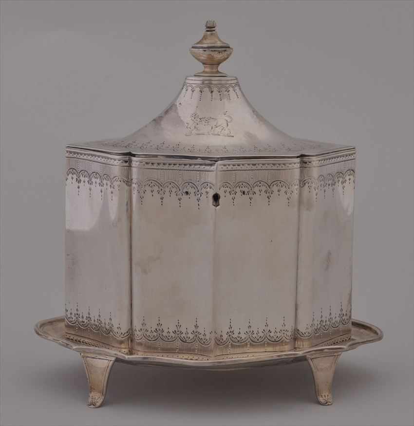 Appraisal: GEORGE III BRIGHT-CUT ENGRAVED SILVER TEA CADDY AND A GEORGE