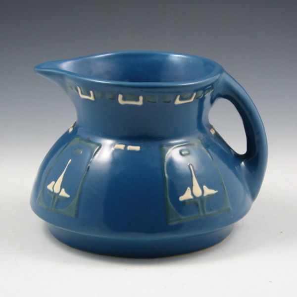 Appraisal: Roseville Aztec - pitcher with squeezebag decoration in blue Unmarked