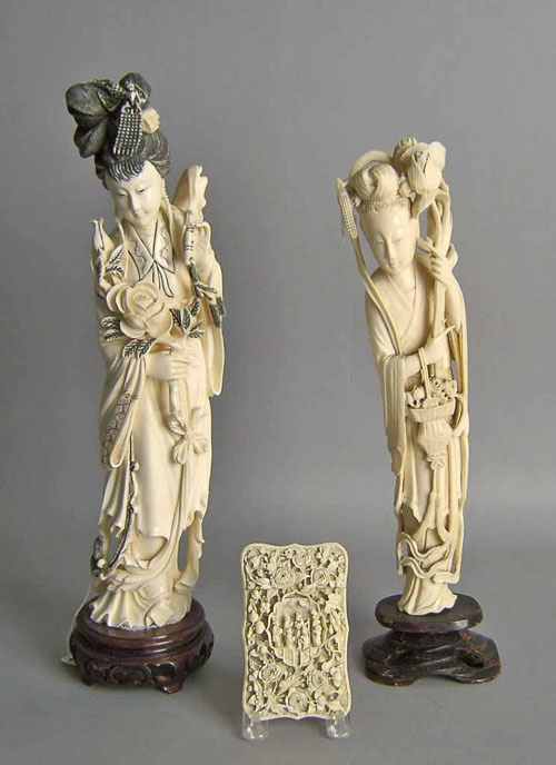 Appraisal: Two Chinese carved ivory figures h h together with a