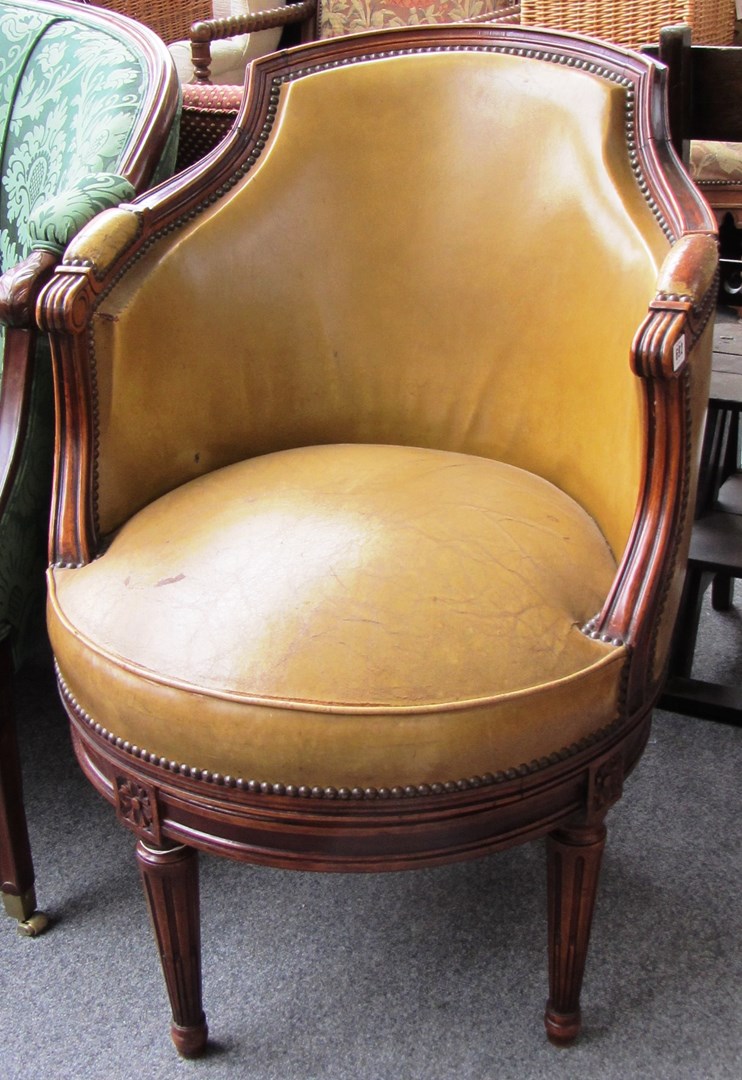 Appraisal: A Louis XV style mahogany framed tub back swivel chair