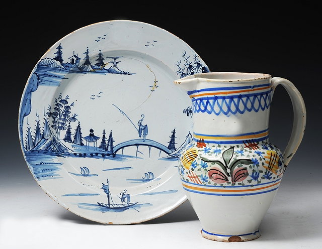 Appraisal: A DELFTWARE CHARGER with Chinese fishermen design circa cm and