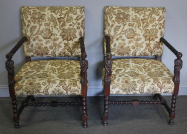 Appraisal: Pair of Chairs with Figural Carved Arms From a White