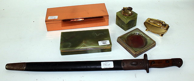 Appraisal: A HARDSTONE AND WHITE METAL MOUNTED SMOKERS SET consisting of