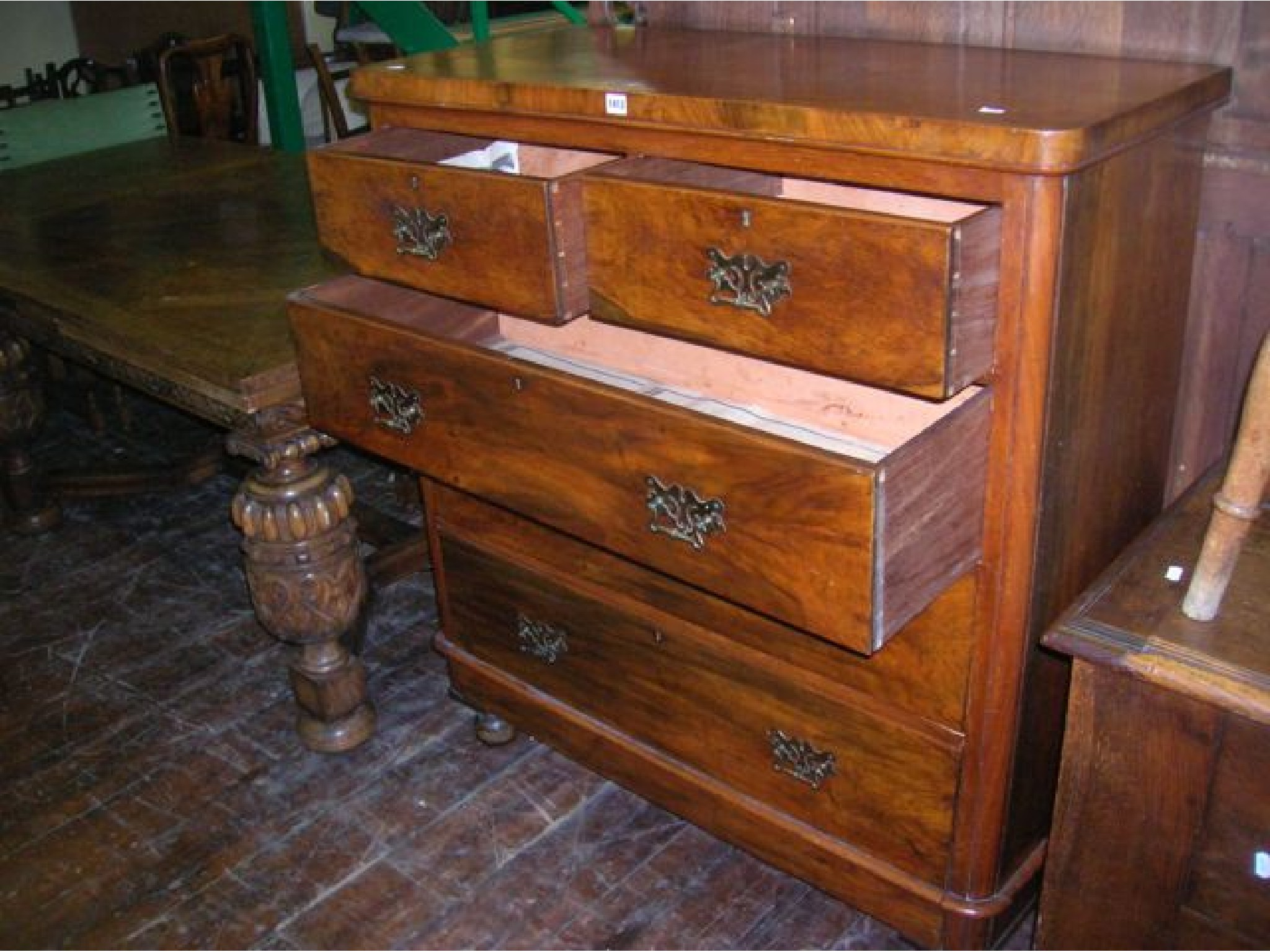 Appraisal: A Victorian walnut chest of three long and two short