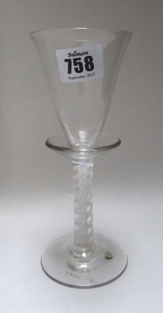 Appraisal: An opaque twist wine glass probably early th century the