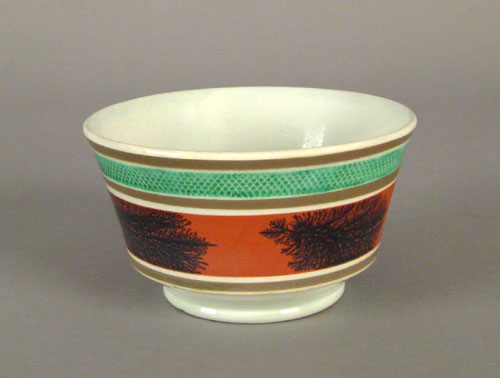 Appraisal: Mocha waste bowl th c with seaweed decoration on an