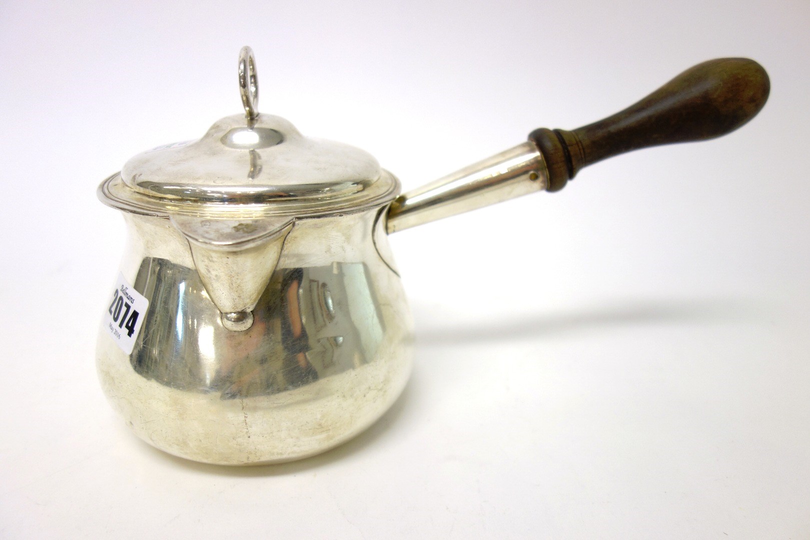 Appraisal: A George III silver brandy saucepan and cover of baluster