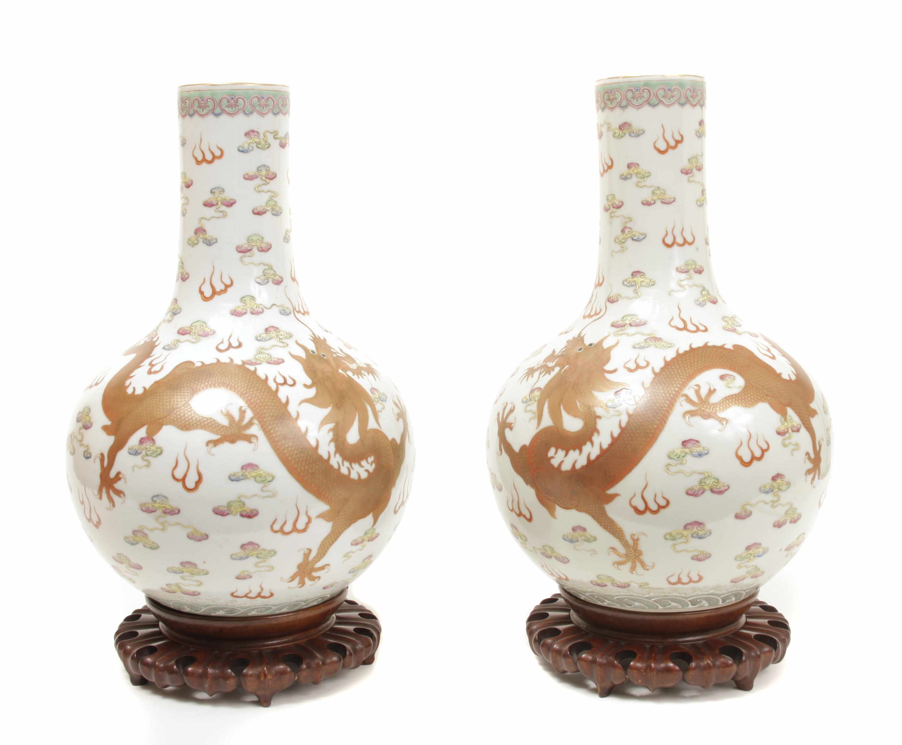 Appraisal: A large pair of Chinese dragon vases height in diameter